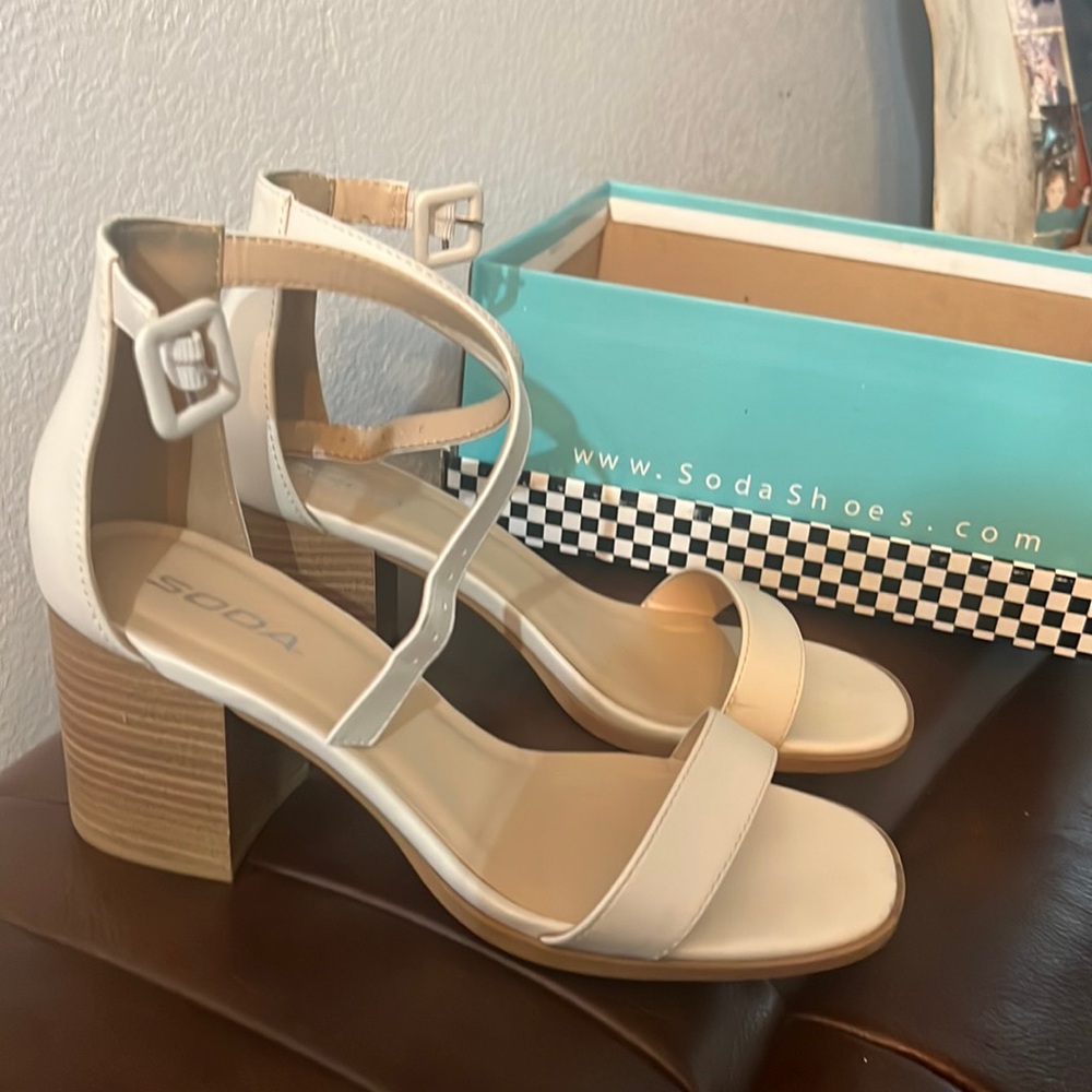 Of white colored sandals